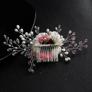 Elegant bridal hair comb with pink fabric flowers, pearls and crystal beads on silver metal