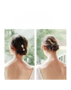 Détail de l'épingle à cheveux fleurie en strass faite main avec cristaux et fils dorés