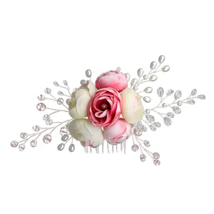 Handmade bridal hair comb with pink fabric flowers, pearls and crystal wire branches