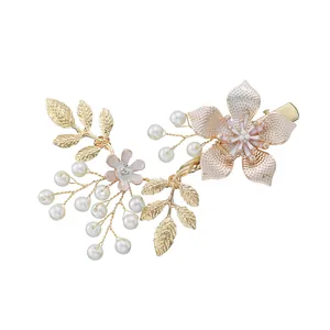 Floral bridal hair clip with gold leaves, pink enamel flowers and white pearls