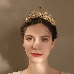 Elegant vintage gold Baroque bridal tiara with amber rhinestones and intricate metalwork