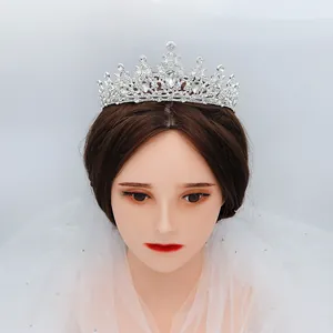 Vintage Baroque silver bridal tiara featuring large pear-cut rhinestone and floral alloy base
