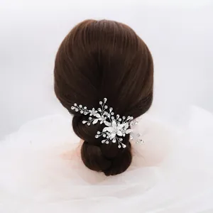 Exquisite silver flower bridal hair clip with sparkling rhinestones and metal leaves