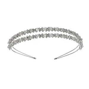Detail of silver double-layered headband featuring sparkling rhinestone embellishments