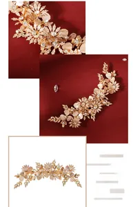 Macro shot of gold bridal hair clip with rhinestones and white shell flower details