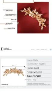 Detail view of a 15x5cm gold bridal hair clip with rhinestones and floral design
