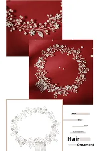 Detail of bridal hair comb with pearls, crystals and silver alloy leaves on silk background
