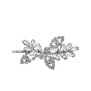 Detail of silver leaf hair clip with marquise cut rhinestones on a minimalist barrette