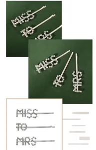 Detailed view of silver hair clips set with MRS, MISS, and TO rhinestone lettering