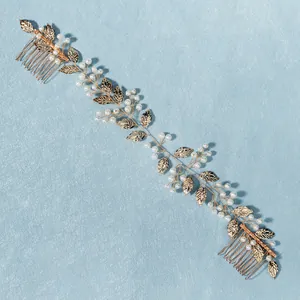 Elegant bridal hair vine with golden alloy leaves, white pearls and double side combs