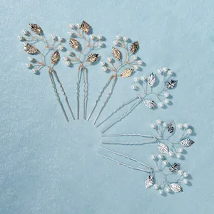 Elegant U-shaped bridal hair pins set with gold and silver leaves and white pearls