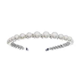 Elegant pearl headband for women featuring white pearls and sparkling crystal accents