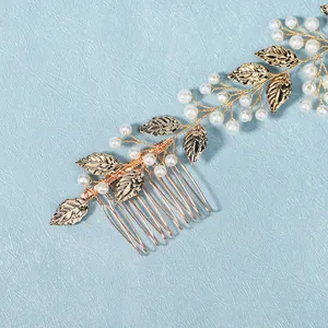 Handmade gold leaf bridal hair comb with elegant white pearls for wedding accessories