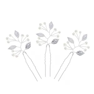 Three-piece silver bridal hair pins set with white pearls and delicate hollow leaf charms