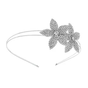 Close-up of a silver floral bridal headband featuring pavé rhinestones and a double-band base
