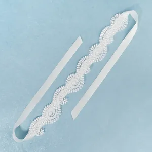 Elegant white lace bridal headband with delicate beads and silk satin ribbon ties