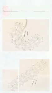 Détails d'un bandeau de mariée argenté avec perles, fleurs en tulle et épingles