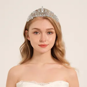 Luxurious silver bridal tiara crown with intricate rhinestone inlay and water drop crystal