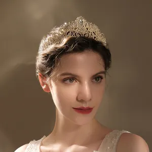 Luxurious gold crown with intricate floral carvings and sparkling diamonds for weddings