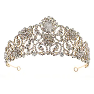 Luxury European style gold crown with sparkling crystals and large central oval gemstone