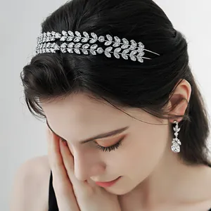 Elegant silver laurel leaf zircon headband and teardrop earring set for weddings