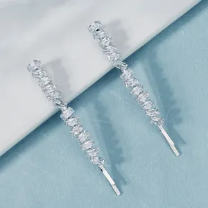 Detail of silver hair clips set featuring rectangular cubic zirconia in a line