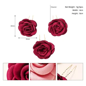 Macro detail of red rose hair pin set showing 8cm length and polyester petal texture