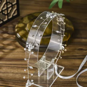 Handmade bridal headband with silver wire, crystals and white silk ribbon for weddings