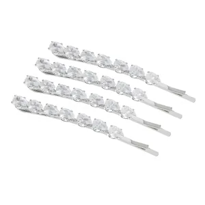 Set of four silver hair clips with pear-shaped rhinestones on a white background