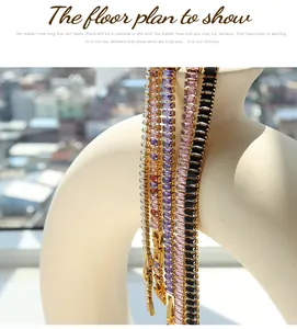 Detail of colorful rectangular zircon tennis chains in gold-plated stainless steel