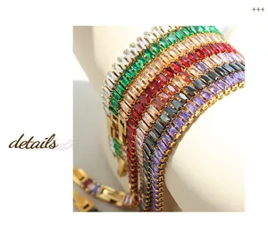 Detail of gold plated tennis bracelets with multi-colored rectangular zircon stones