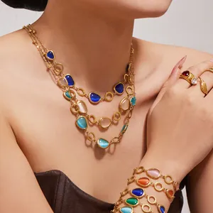 Luxus-Schmuckset mit ovalem Katzenauge-Stein und mehrlagigen 18k vergoldeten Ketten