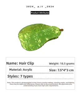 Detail of green pear shaped hair claw clip with wrinkled texture and dimensions text