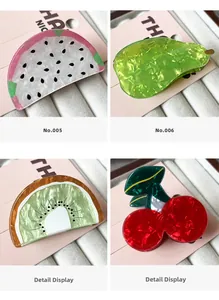 Macro detail of acetate fruit hair claws showing dragon fruit and kiwi textures