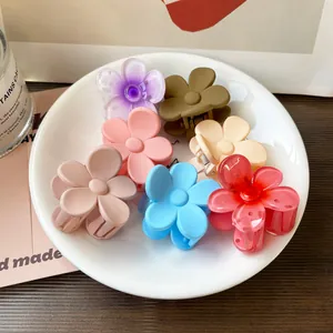 Colorful floral resin hair claws set in matte and glossy finishes for women