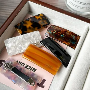 French handmade acetate hair clips in assorted marble and tortoiseshell patterns