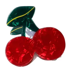 Elegant cherry hair claw clip made of marble texture acetate with red and green finish