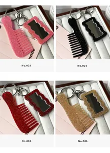 Detail of glitter acrylic heart vanity mirror and comb keychains in four vibrant colors