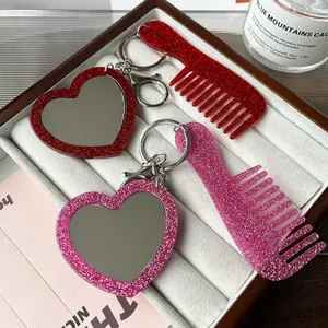 Set portachiavi specchio a cuore e pettine in acrilico glitterato per borse