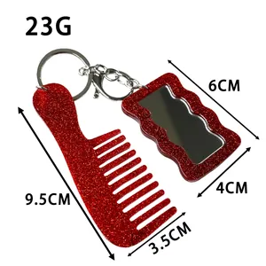 Red glittery acrylic mirror and comb keychain set shown with clear size dimensions
