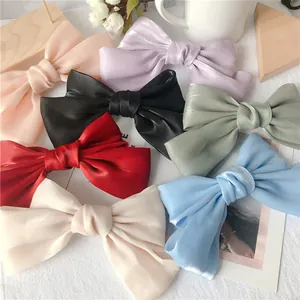 Barrettes à cheveux élégantes avec nœud en tissu nacré en plusieurs coloris pour femmes