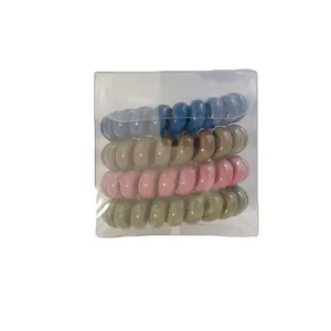 Juego de 4 coleteros de espiral Morandi en una caja de regalo transparente