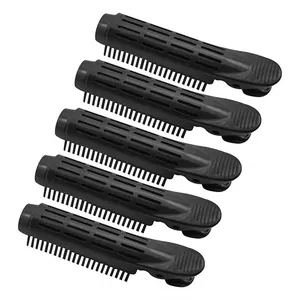 Detailed view of 5-piece black plastic hair root volume clips with fine comb teeth