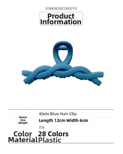 Matte Klein blue claw clip detail showing the 12cm length and large twisted design