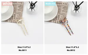Detailed size view of elegant acetic acid butterfly U-shaped hair pins in white and tortoise