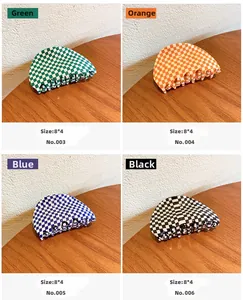 Detailansicht der 8x4cm Schachbrett-Haarklammern in Grün, Orange, Blau und Schwarz