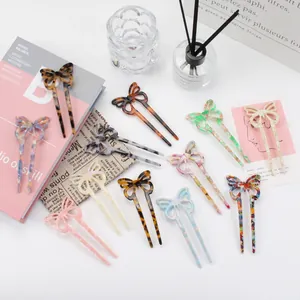 Elegant acetate butterfly hair fork in multiple tortoise shell and marble patterns