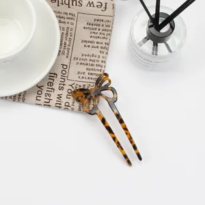 Elegant tortoiseshell acetate butterfly hair stick for women in a minimalist style