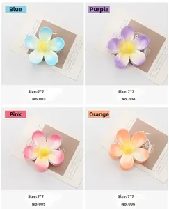 Vier matte Blumen-Haarklammern in Blau Lila Rosa und Orange Größe sieben mal sieben cm