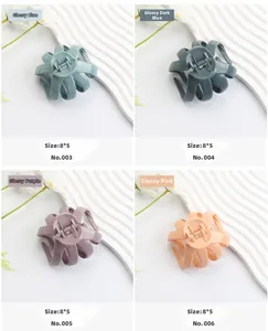 Détail des pinces à cheveux pieuvre brillantes de 8x5 cm en quatre couleurs avec ressort